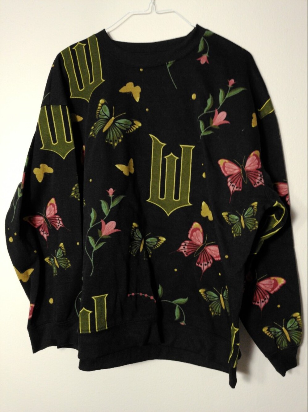 Black Butterfly Print Sweatshirt with Pink & Green Accents
